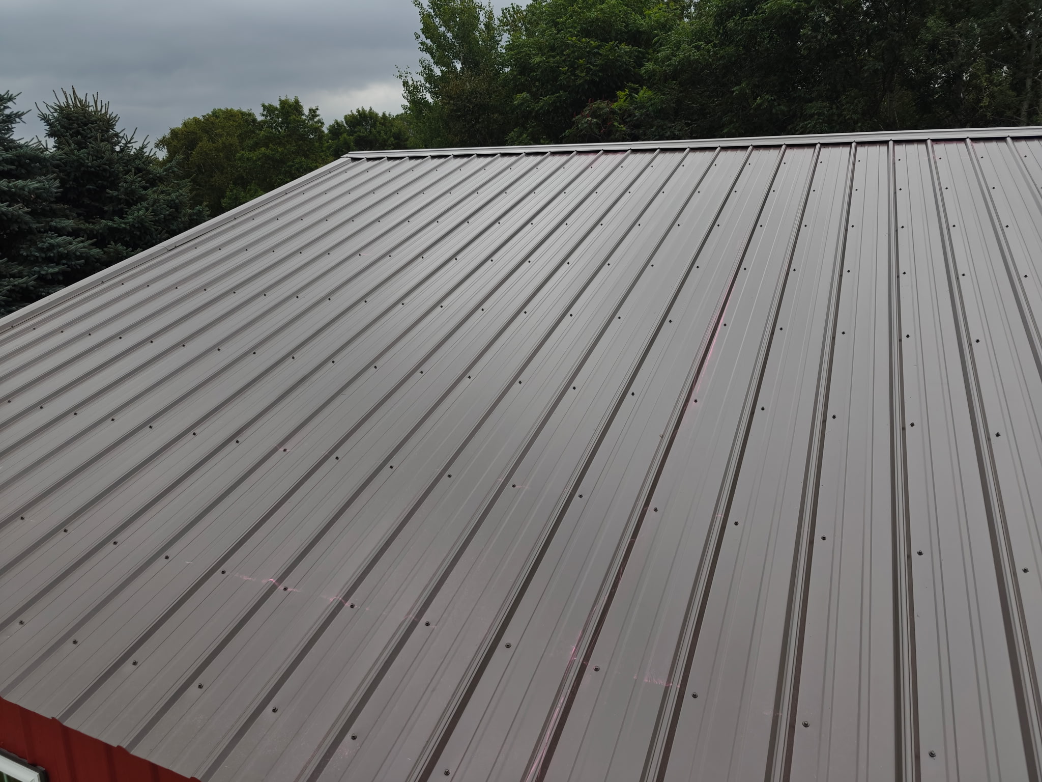 Finished gray metal roof on a home